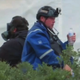 Fox News footage of a man identified by authorities as Guy Reffitt, pictured here outside the Capitol on January 6 using water to rinse his eyes with a chemical irritant, and included as evidence in his indictment.